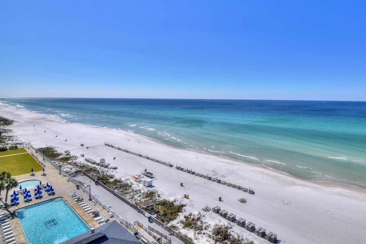 On the beach, sun-loungers