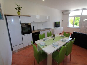 Private kitchen | Fridge, microwave, oven, stovetop - Apartments Nero (Novi Vinodolski)