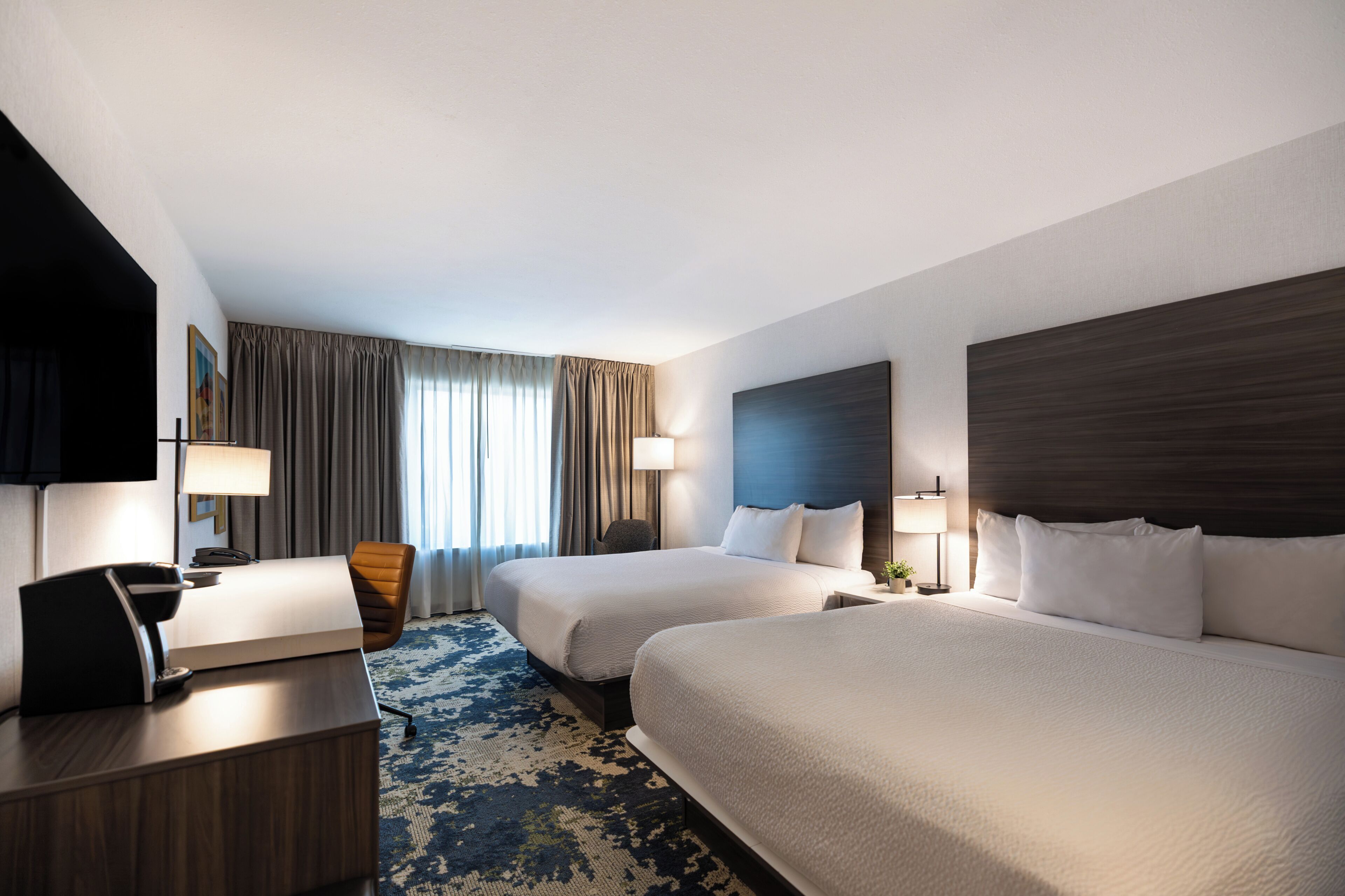 Standard Room, 2 Queen Beds | Pillowtop beds, in-room safe, desk, blackout drapes