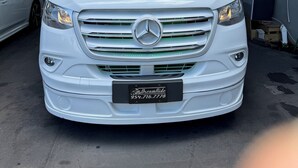 A white Mercedes-Benz van parked inside a garage with a metal roof and concrete walls. - MASSIVE HOME WITH HEATED POOL, NEAR BEACH IN SUNNY SOUTH FLORIDA  (Dania Beach)