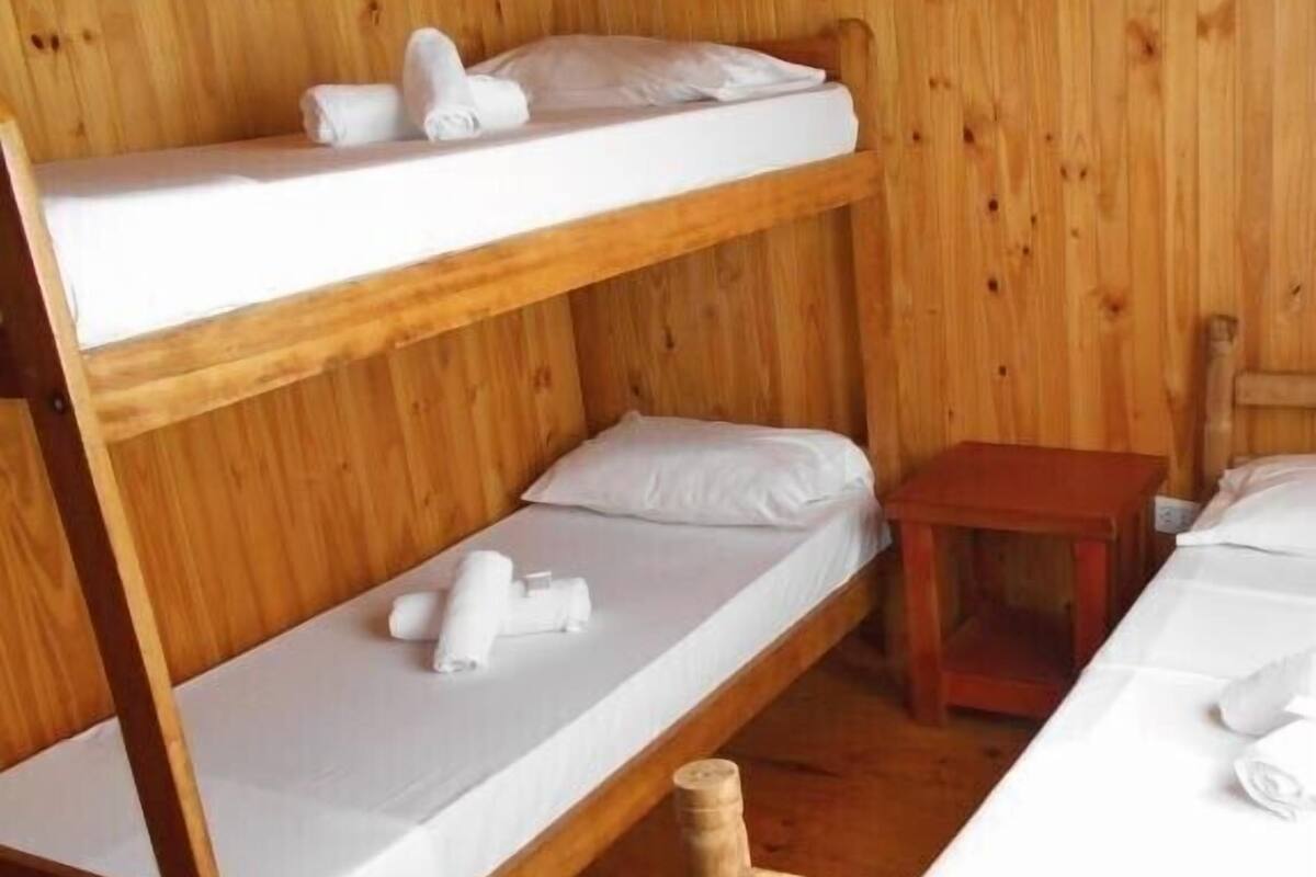 Cabaña clásica, 2 habitaciones, balcón, junto a la alberca | Vista desde la habitación