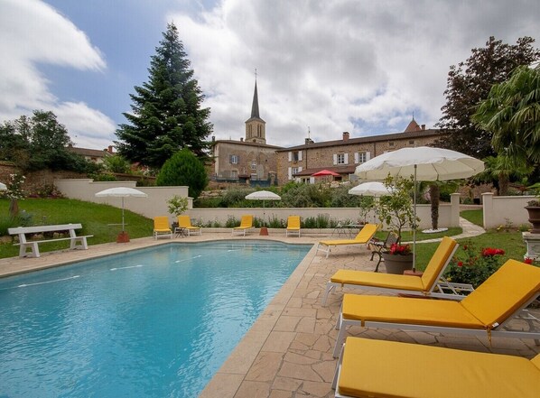 Seasonal outdoor pool, pool umbrellas, pool loungers