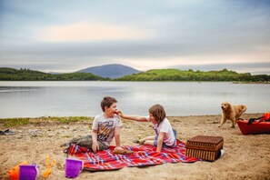 On the beach, beach towels - Lakehouse Apartment With Hot Tub & Sauna , Stunning Views On The Lake (Foxford)
