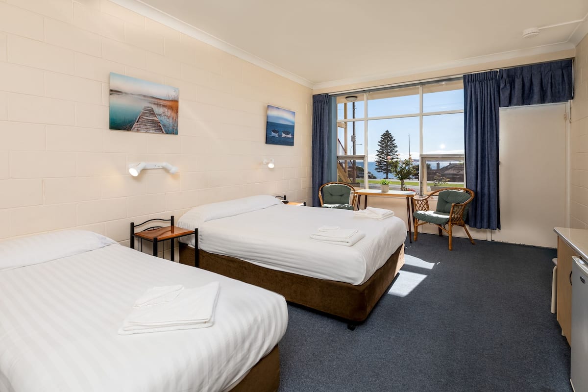 Quadruple Room | Blackout curtains, iron/ironing board, free WiFi, bed sheets