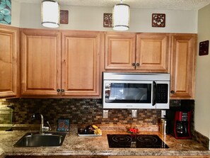 Full-sized fridge, microwave, coffee/tea maker, toaster