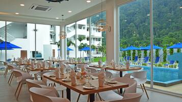 Breakfast, lunch, dinner served; local cuisine