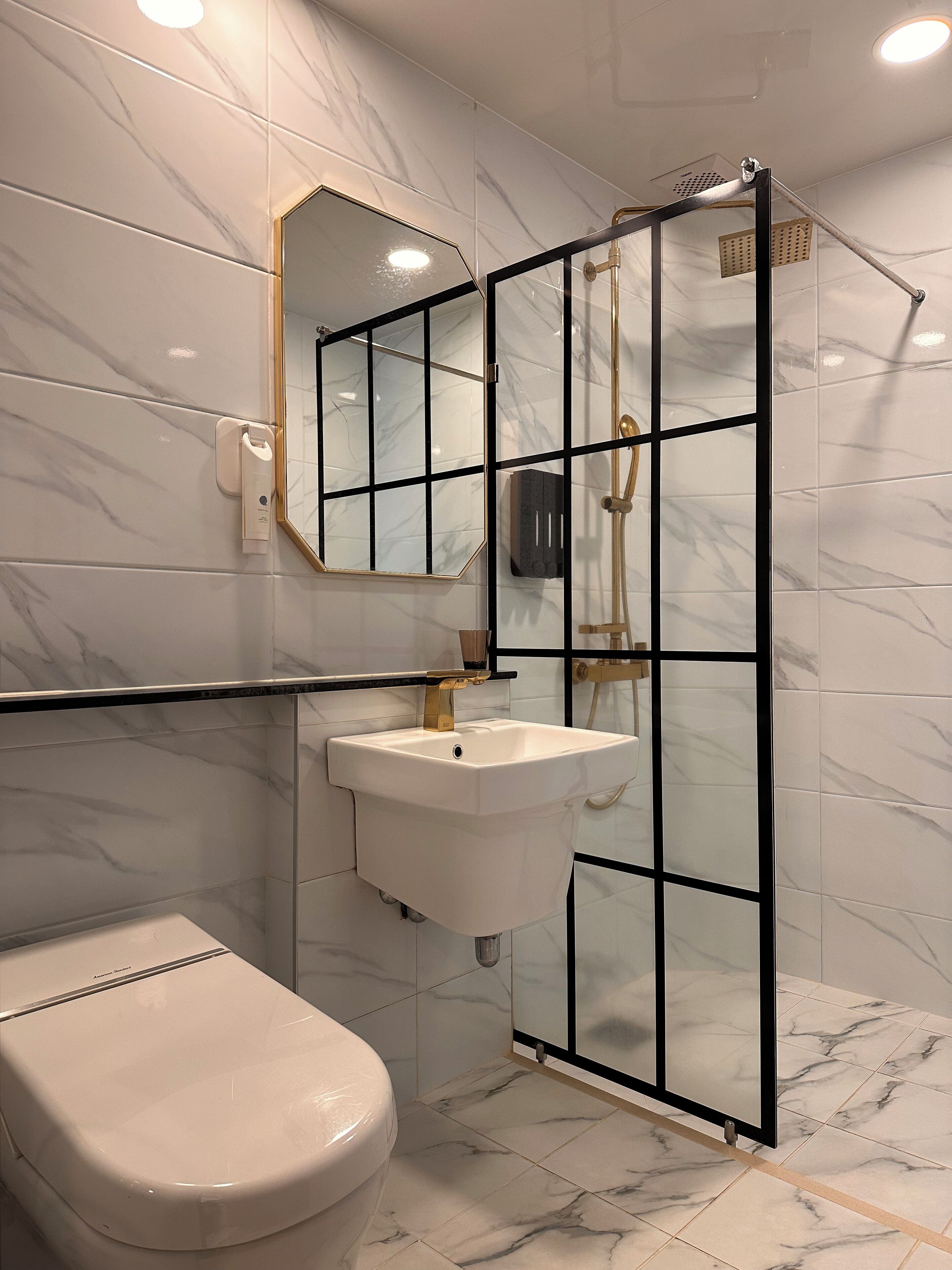 aewol suite | bathroom | shower, hair dryer, slippers, bidet