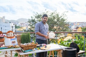 Breakfast, lunch, dinner served; local and international cuisine