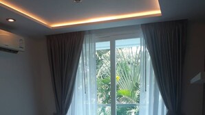 One Bedroom Apartment with Garden View | 1 ห้องนอน, ห้องเก็บเสียง, เตารีด/โต๊ะรีดผ้า, Wi-Fi ฟรี
