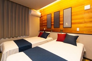 Kamer (EAST101) | Individueel gedecoreerd, een laptopwerkplek, gratis wifi, beddengoed