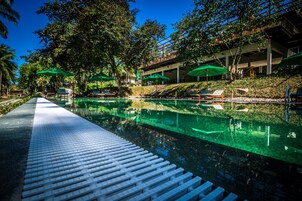 Outdoor pool, open 7:00 AM to 5:00 PM, sun loungers