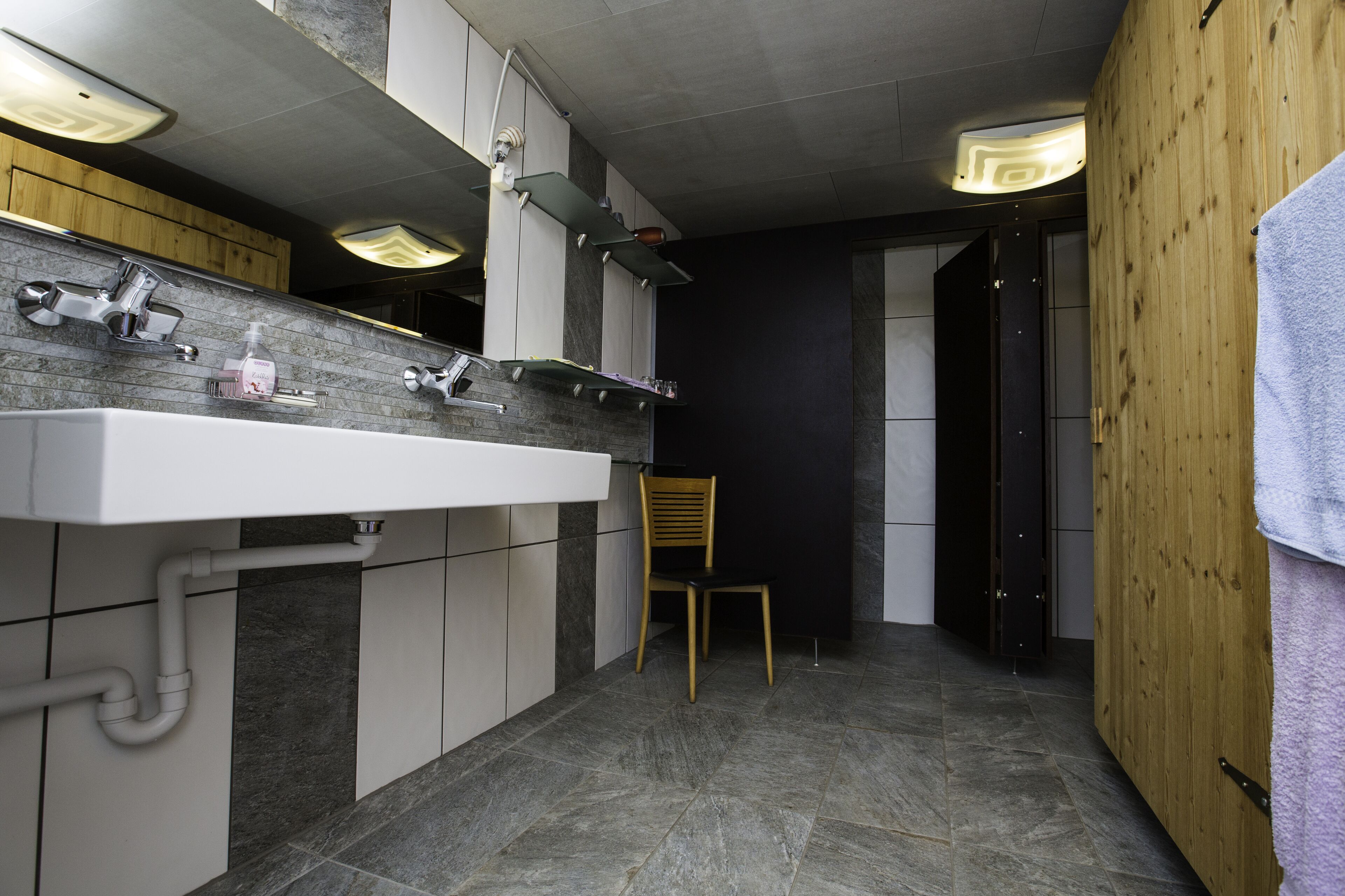 Shower, free toiletries, hair dryer, slippers