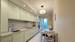 Departamento Confort, 3 habitaciones | Cocina privada