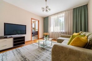 Appartement Classique, 1 chambre | Coin séjour | Télévision à écran plat de 100 cm avec chaînes numériques, télévision