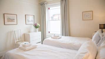 4 bedrooms, laptop workspace, iron/ironing board, bed sheets