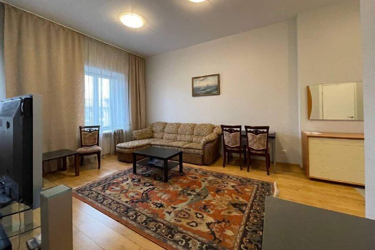 Apartment, 2 Bedrooms | Living area | 100-cm flat-screen TV with digital channels, TV