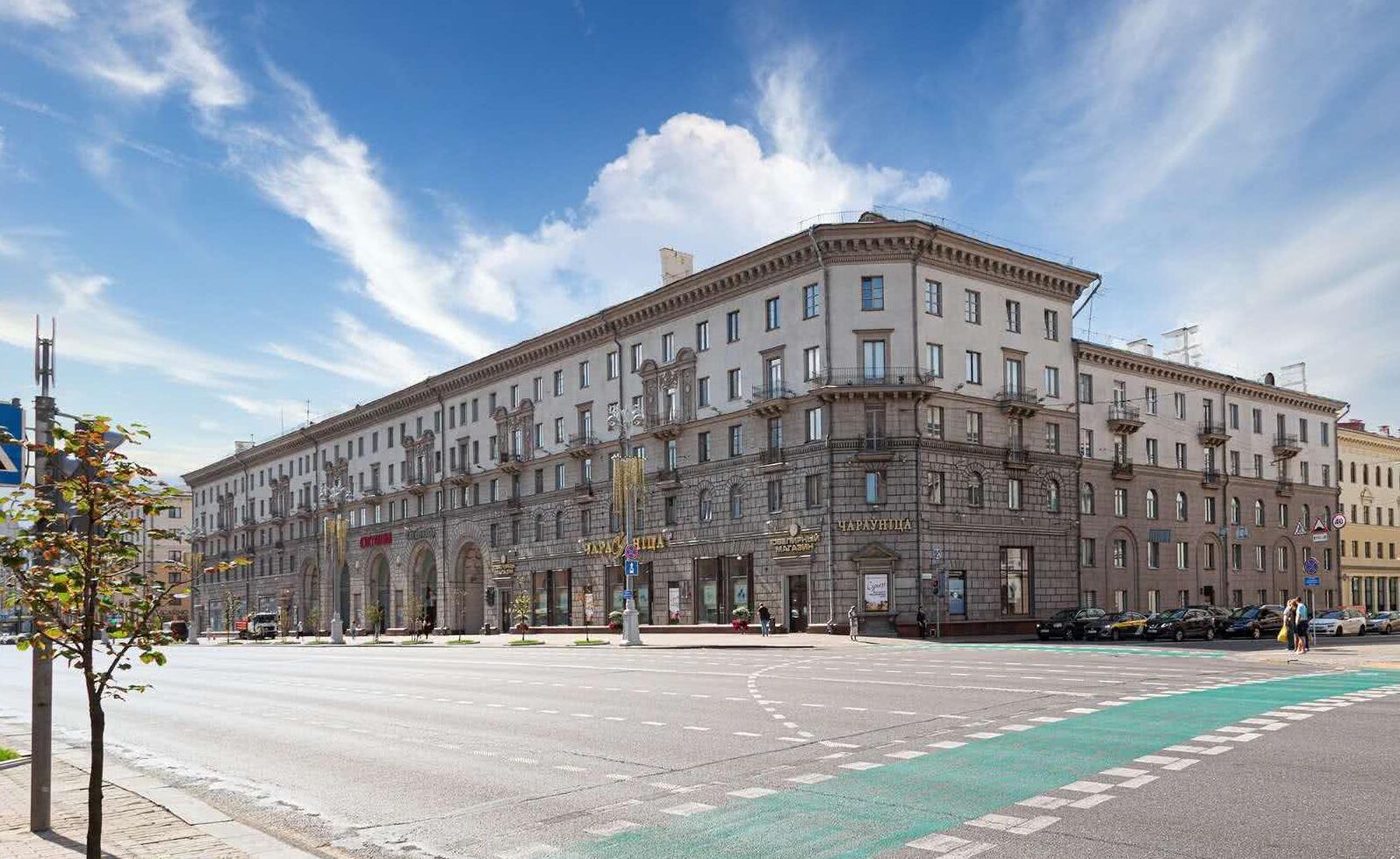 A large, historic building with multiple floors and a prominent entrance.