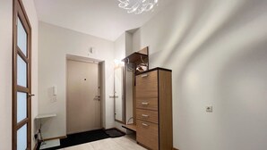 Apartamento Deluxe, 1 habitación | Zona de estar