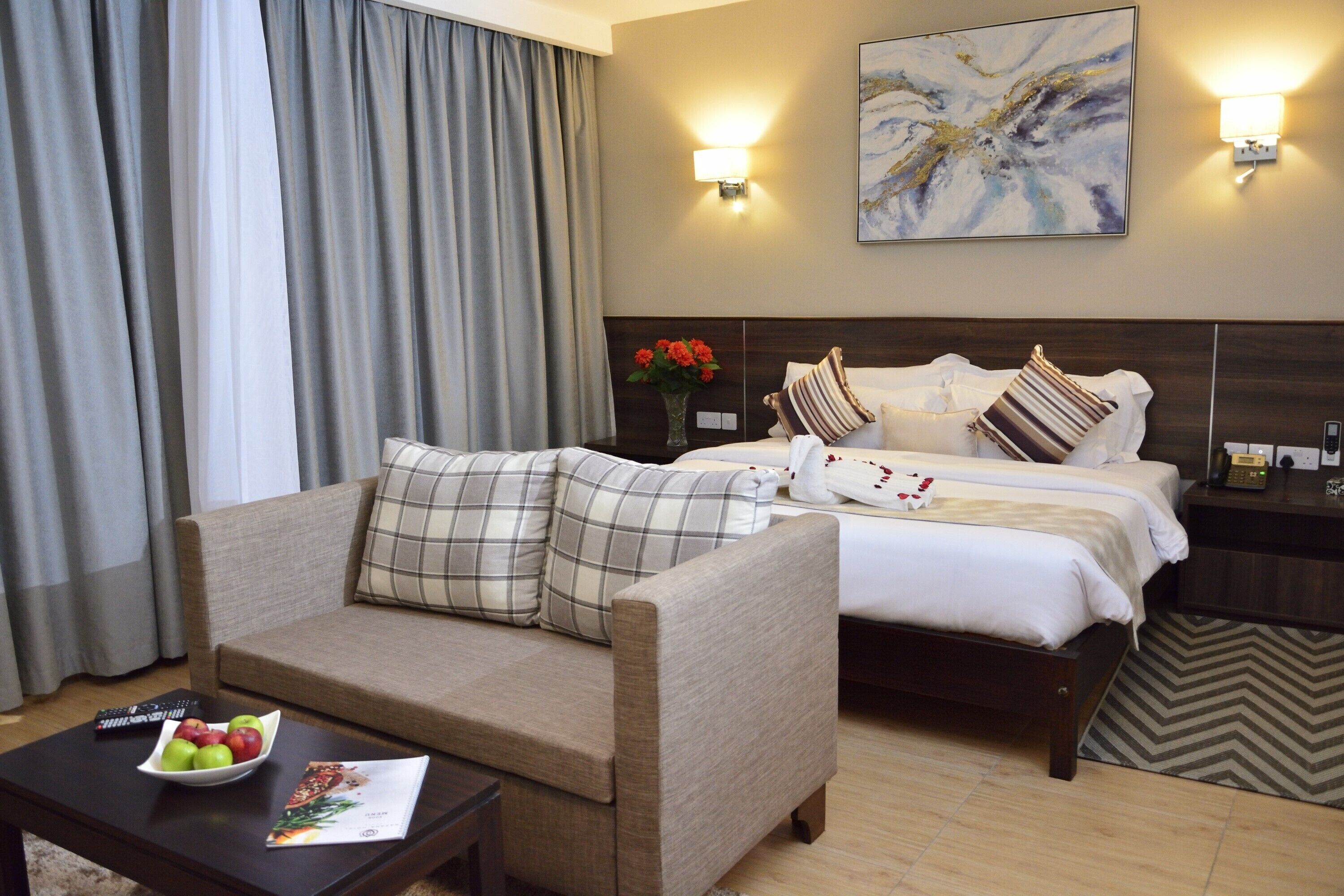 family room | minibar, in-room safe, desk, laptop workspace