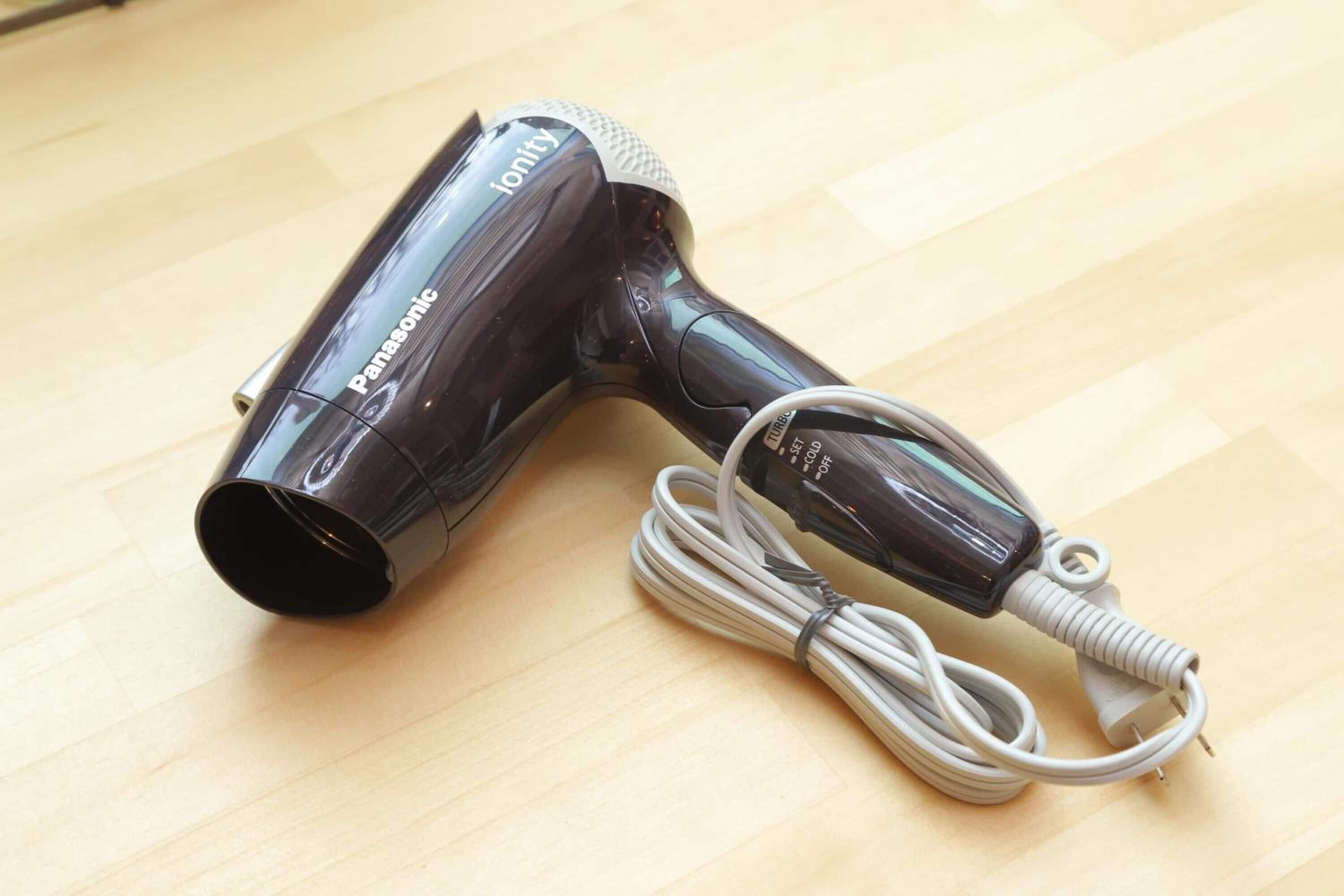 shower, hair dryer, slippers, electronic bidet