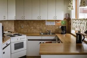 Réfrigérateur dans l'espace commun, micro-ondes dans l'espace commun