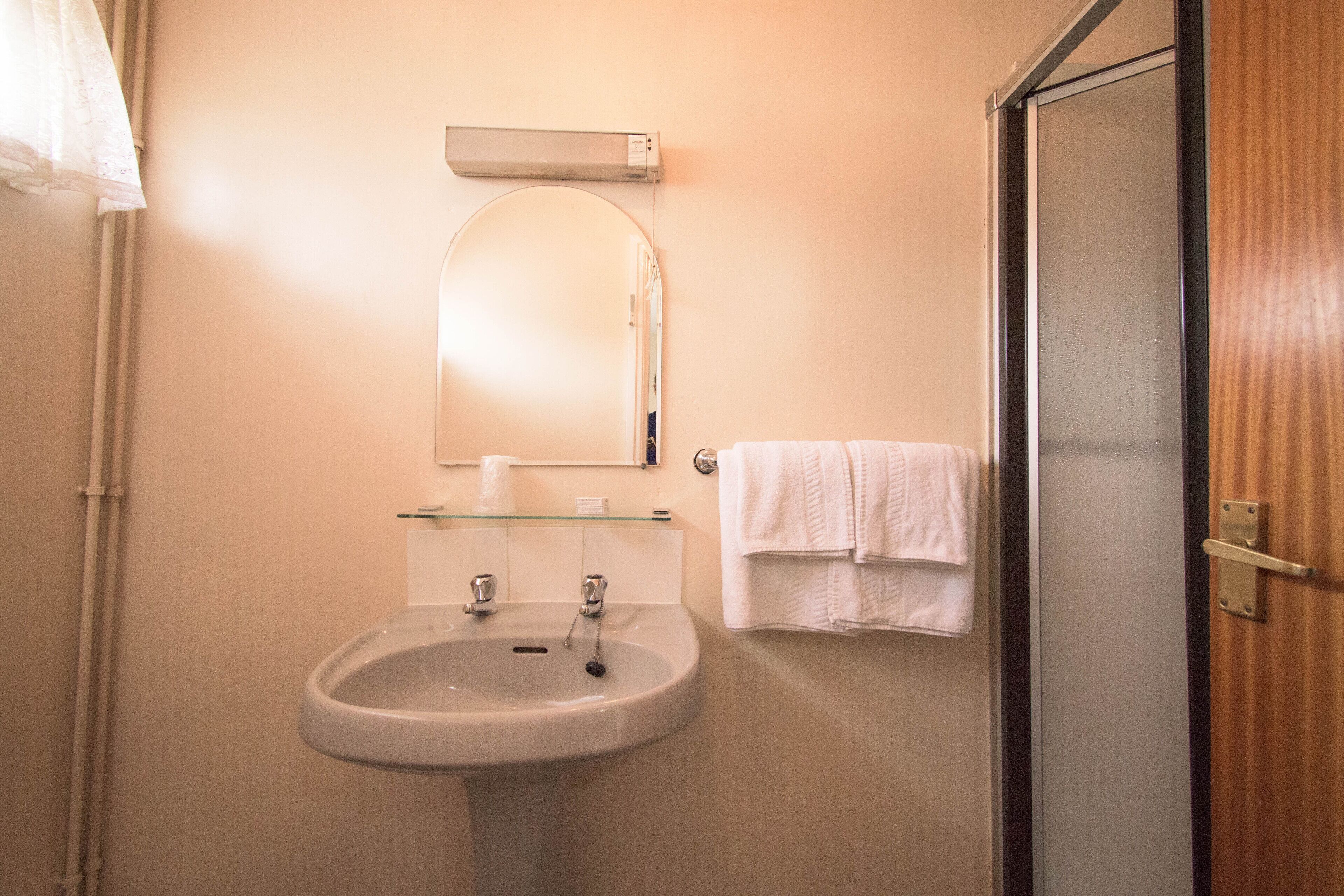 shower, free toiletries, hair dryer, towels