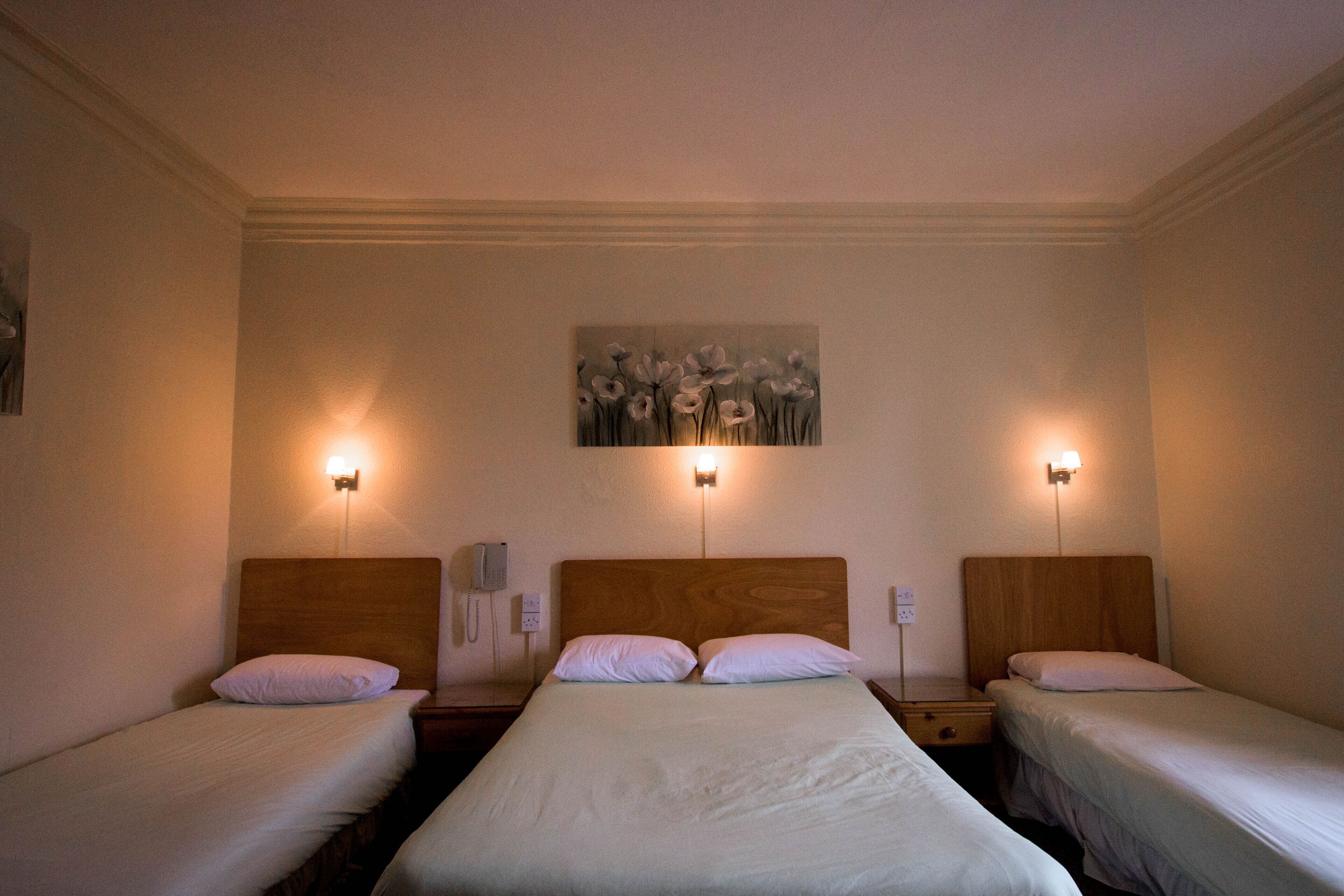 standard family room (sleeps 4) | 1 bedroom, individually decorated, individually furnished, desk