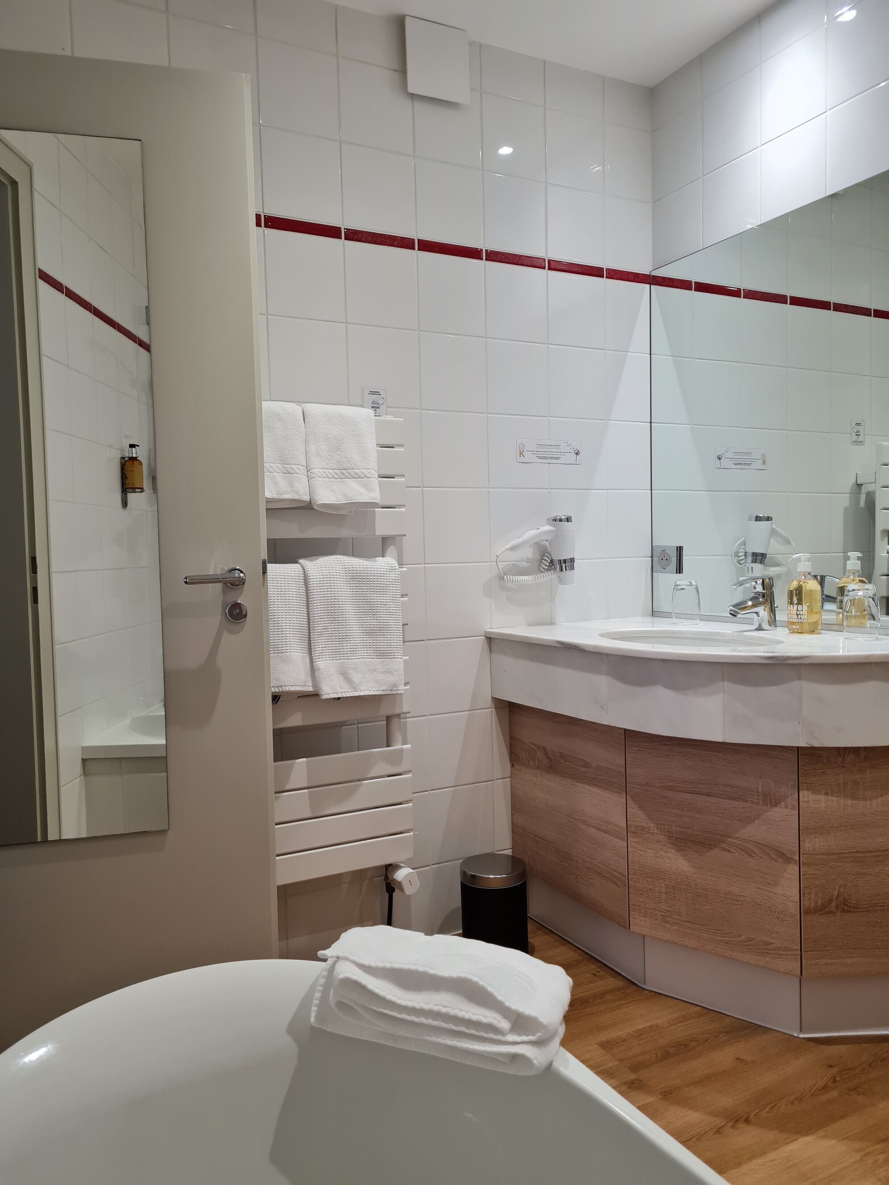 standard twin room | bathroom | hair dryer, towels, soap, shampoo