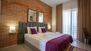 1 chambre, matelas Select Comfort, minibar, fer et planche à repasser