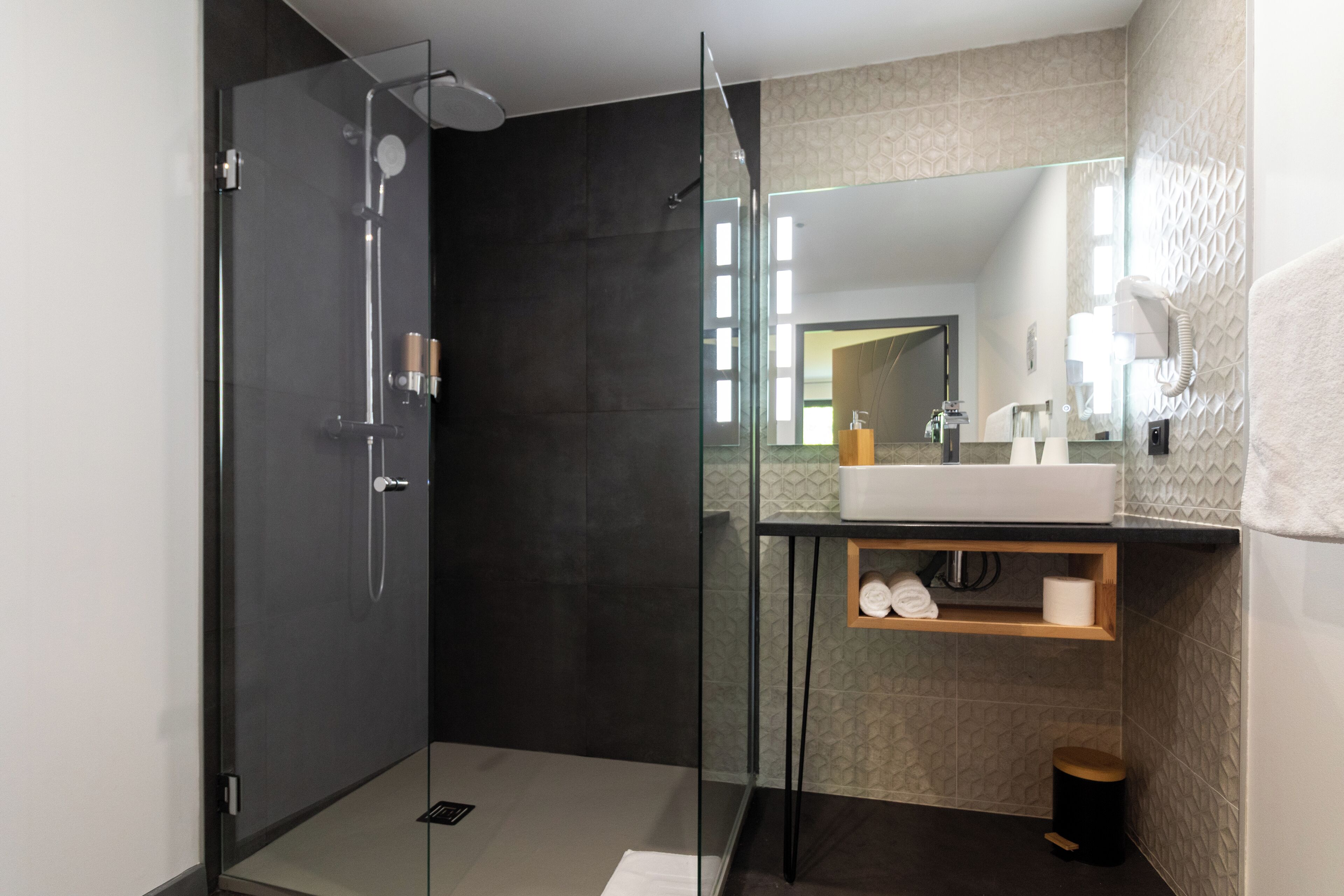 standard double room | bathroom | shower, hair dryer, towels, soap