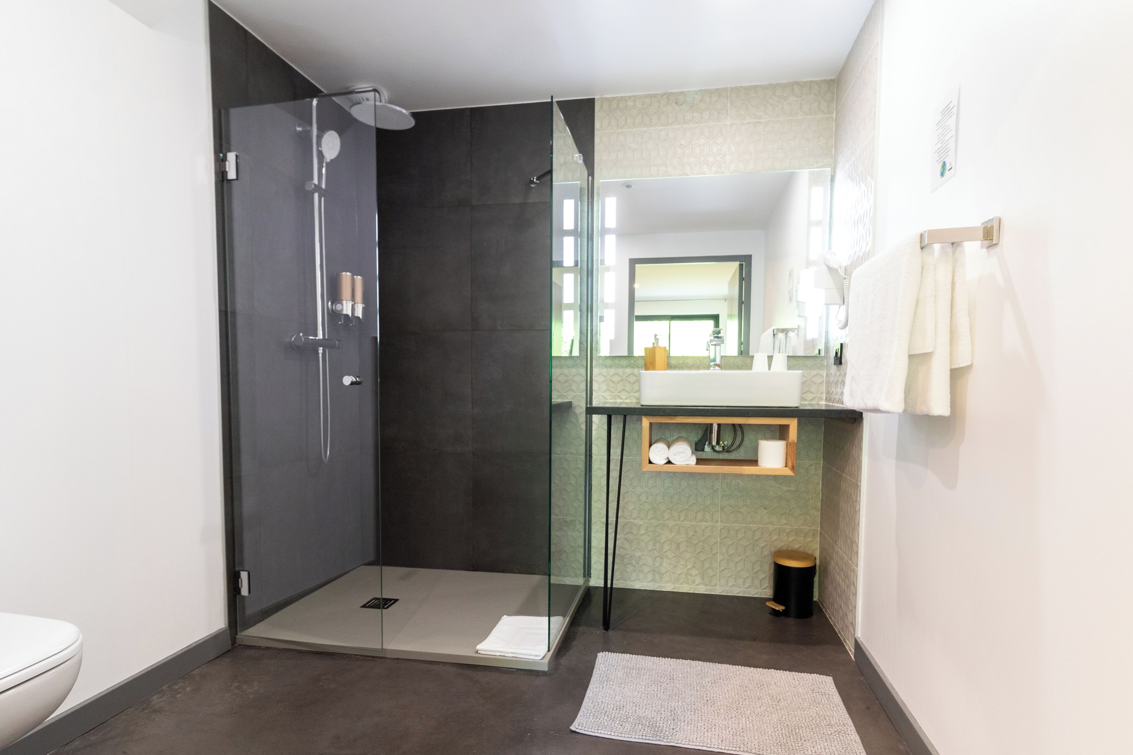 standard double room | bathroom | shower, hair dryer, towels, soap