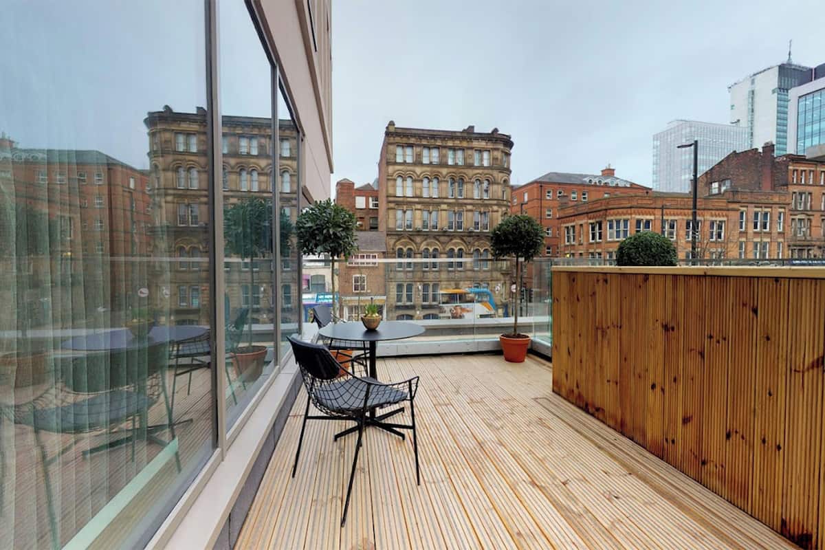 suite, 1 king bed (furnished balcony) | in-room safe, individually decorated, individually furnished, desk