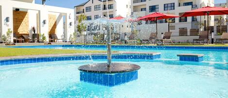 Seasonal outdoor pool, pool umbrellas, sun loungers