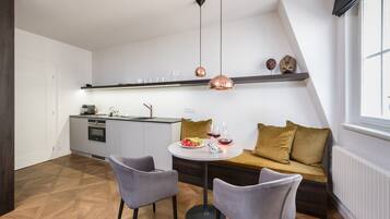 Superior Studio | Living area | TV