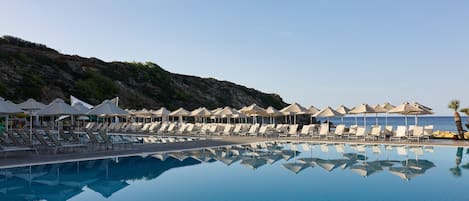 Indoor pool, 5 outdoor pools, open 10:30 AM to 6:30 PM, pool umbrellas