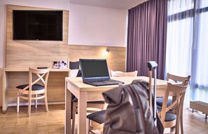 Desk, blackout curtains, soundproofing, free WiFi