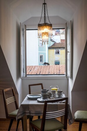 Apartamento, 1 quarto | Área de estar | TV de tela plana