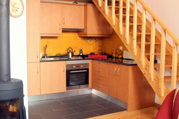 Appartamento, 1 camera da letto | Cucina privata | Frigorifero con congelatore, microonde, forno, piano cottura