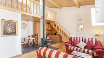 Apartment, 1 Bedroom | Living area | Flat-screen TV