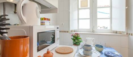 Departamento, 1 habitación | Cocina privada | Refrigerador con congelador, microondas, horno y parrilla de estufa