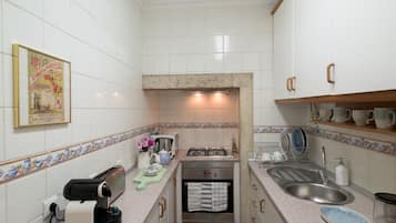 Apartment, 2 Bedrooms | Private kitchen | Full-size fridge, stovetop, dishwasher, espresso maker