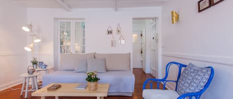 Apartment, 1 Bedroom | Living room | Flat-screen TV