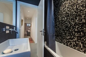 Apartment, 2 Bedrooms | Bathroom | Hair dryer, towels, soap, toilet paper - Renovated Apartment w/ Private Courtyard, By TimeCooler (Lisbon)