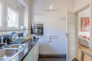 Apartment, 2 Bedrooms | Private kitchen | Full-size fridge, microwave, oven, stovetop - Sunny, Bright and Quiet Apartment, By TimeCooler (Lisbon)