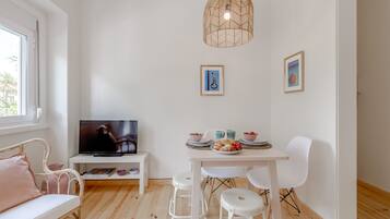 Apartment, 2 Bedrooms | Living room | Flat-screen TV