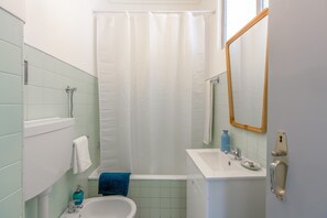 Apartment, 1 Bedroom | Bathroom | Bathtub, hair dryer, bidet, towels - Renovated Sunny Apartment with Balcony, By TimeCooler (Lisbon)