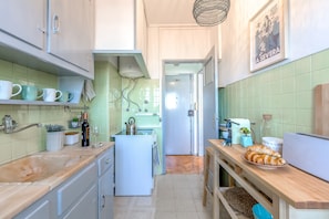 Apartment, 1 Bedroom | Private kitchen | Fridge, microwave, oven, stovetop - Renovated Sunny Apartment with Balcony, By TimeCooler (Lisbon)