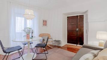 Apartment, 1 Bedroom | Living area | Flat-screen TV