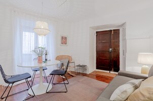 Apartamento, 1 quarto | Área de estar | TV de tela plana