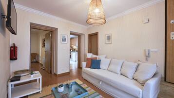 Apartment, 2 Bedrooms | Living area | Flat-screen TV